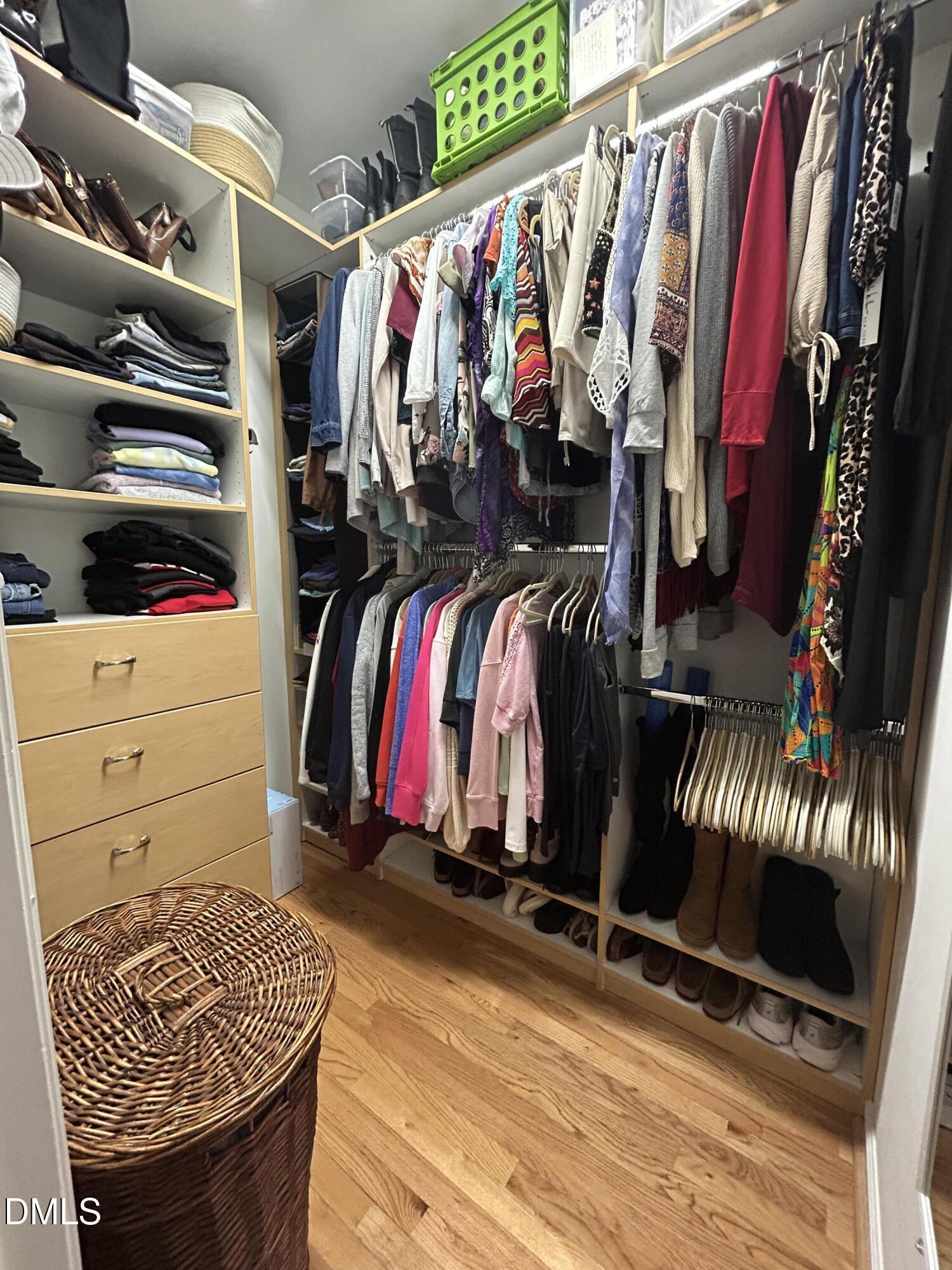 1214 Halcyon Place Rougemont, NC 27572 - Photo 12 of 69 a view of walk in closet with clothes and shoes