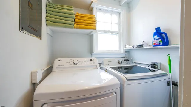 a utility room with dryer and washer