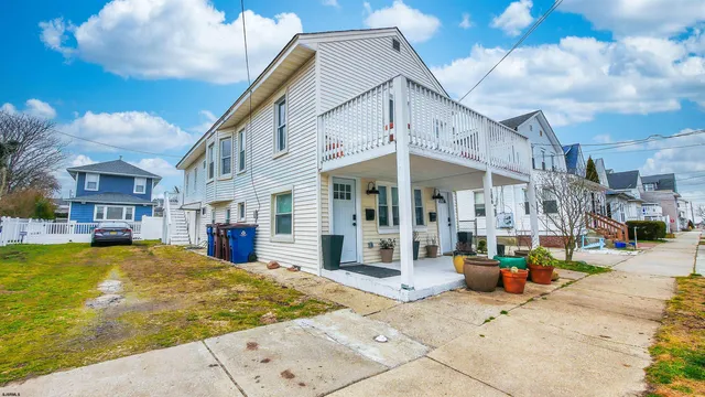 a view of a building with sitting area