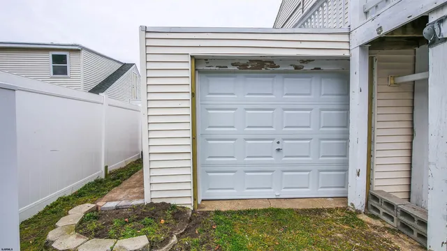 a view of front door and yard
