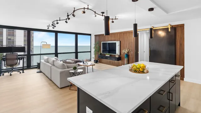 a living room with furniture and flat screen tv