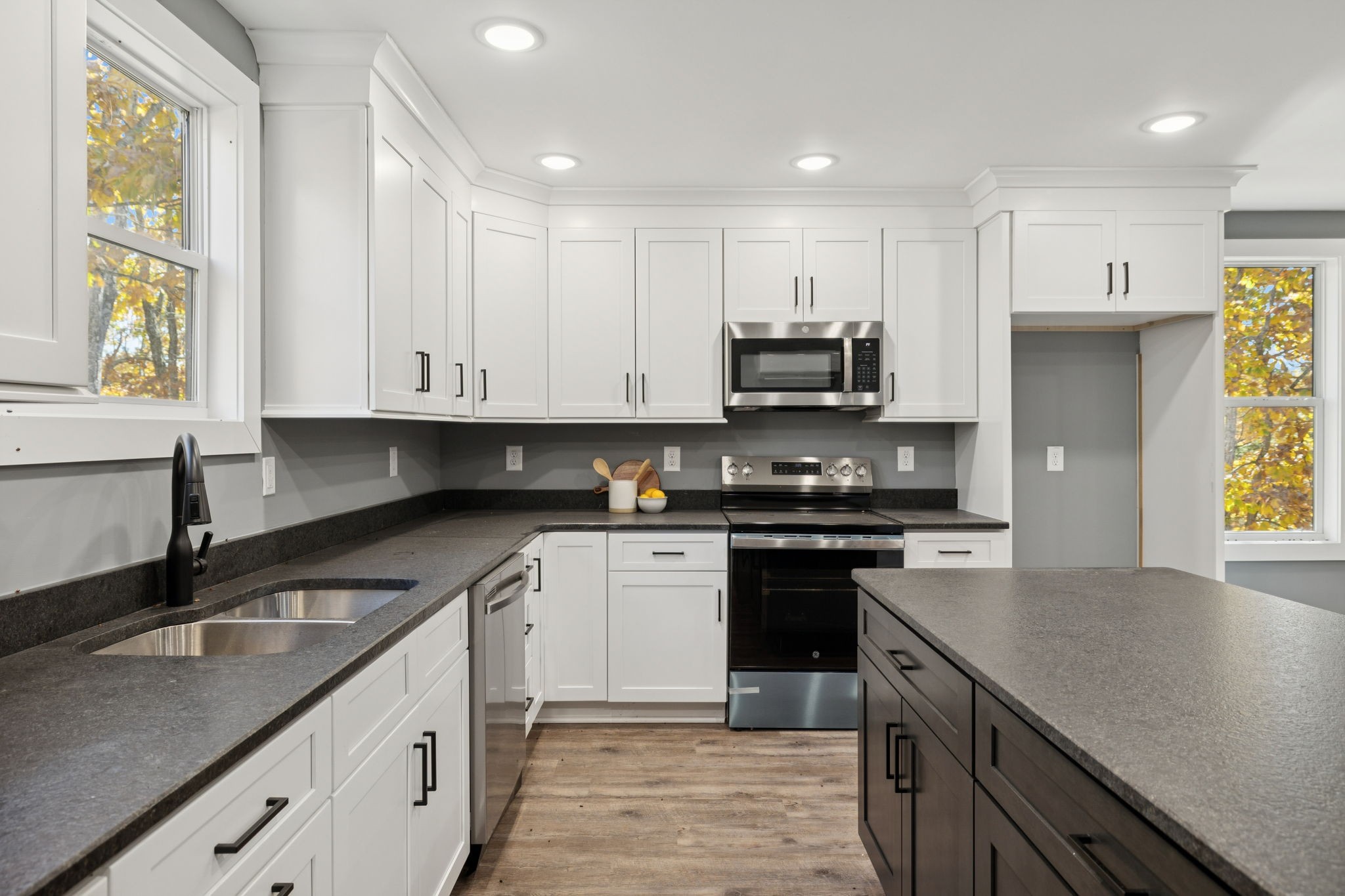1529 Pea Ridge Road Liberty, TN 37095 - Photo 19 of 53 a kitchen with stainless steel appliances granite countertop a sink stove and refrigerator