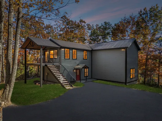 a view of an empty room with windows