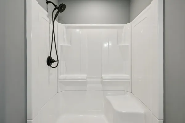 a close view of a sink and a mirror in a bathroom