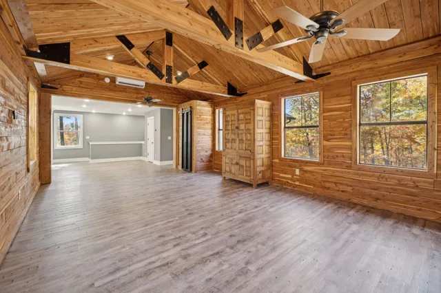 a kitchen with a stove a refrigerator and a sink