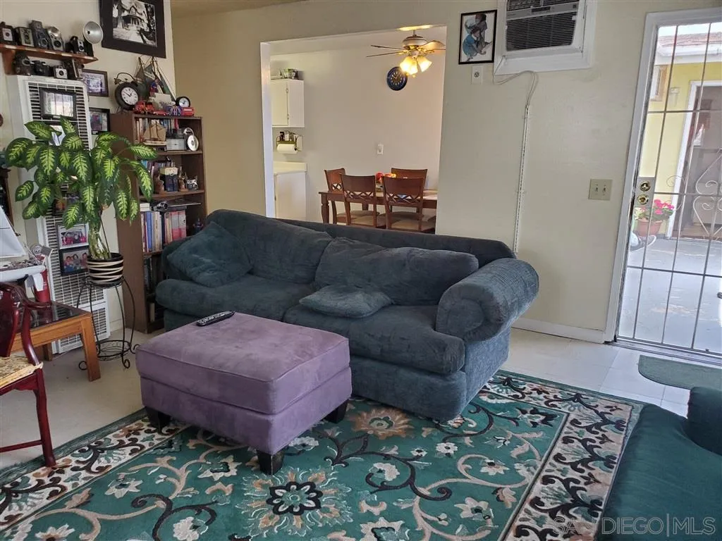 333 Lansing Circle Escondido, CA 92025 - Photo 11 of 18 a living room with furniture and a potted plant