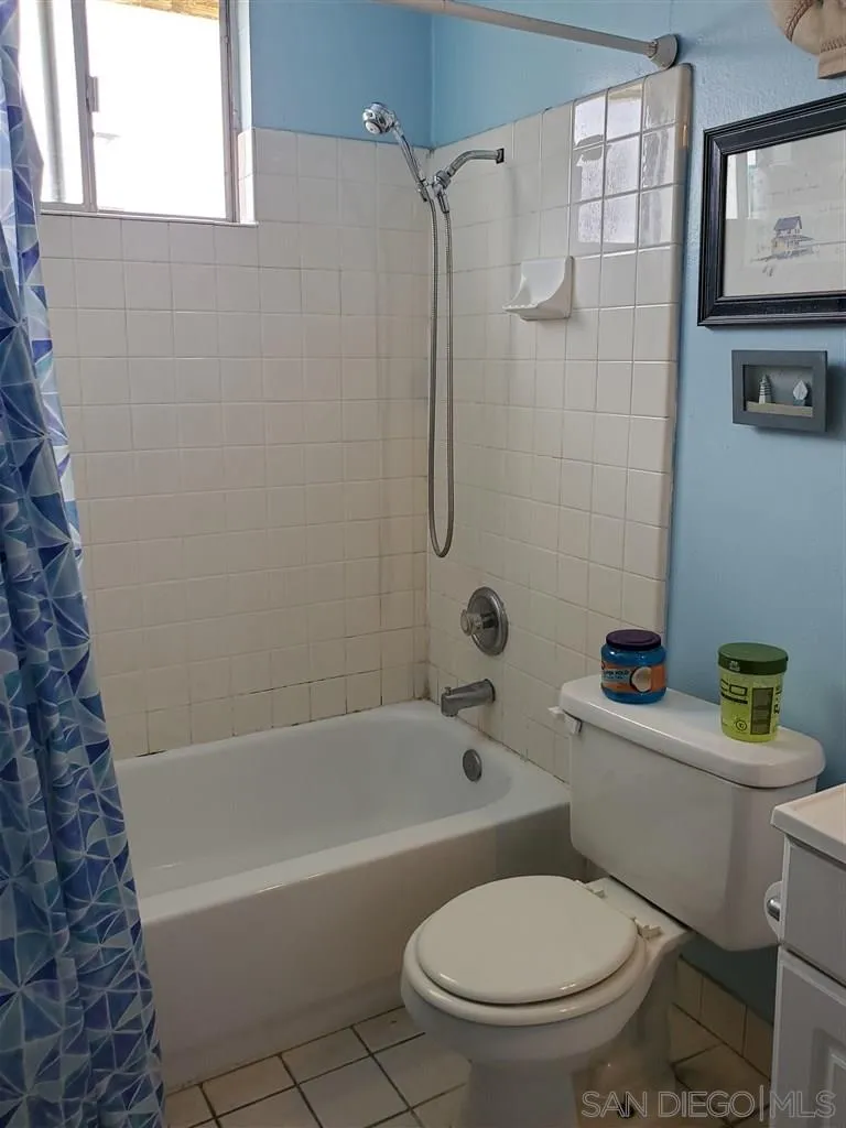 333 Lansing Circle Escondido, CA 92025 - Photo 13 of 18 a white toilet sitting next to a bath tub shower
