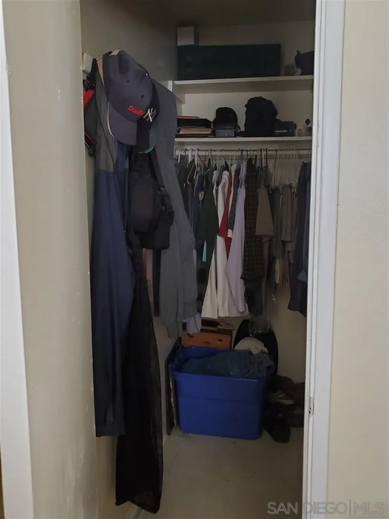 333 Lansing Circle Escondido, CA 92025 - Photo 17 of 18 a view of walk in closet with clothes