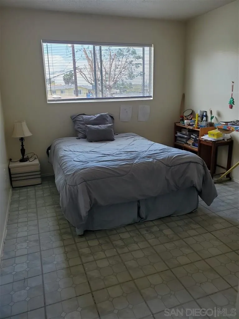 333 Lansing Circle Escondido, CA 92025 - Photo 18 of 18 a bedroom with a bed and window