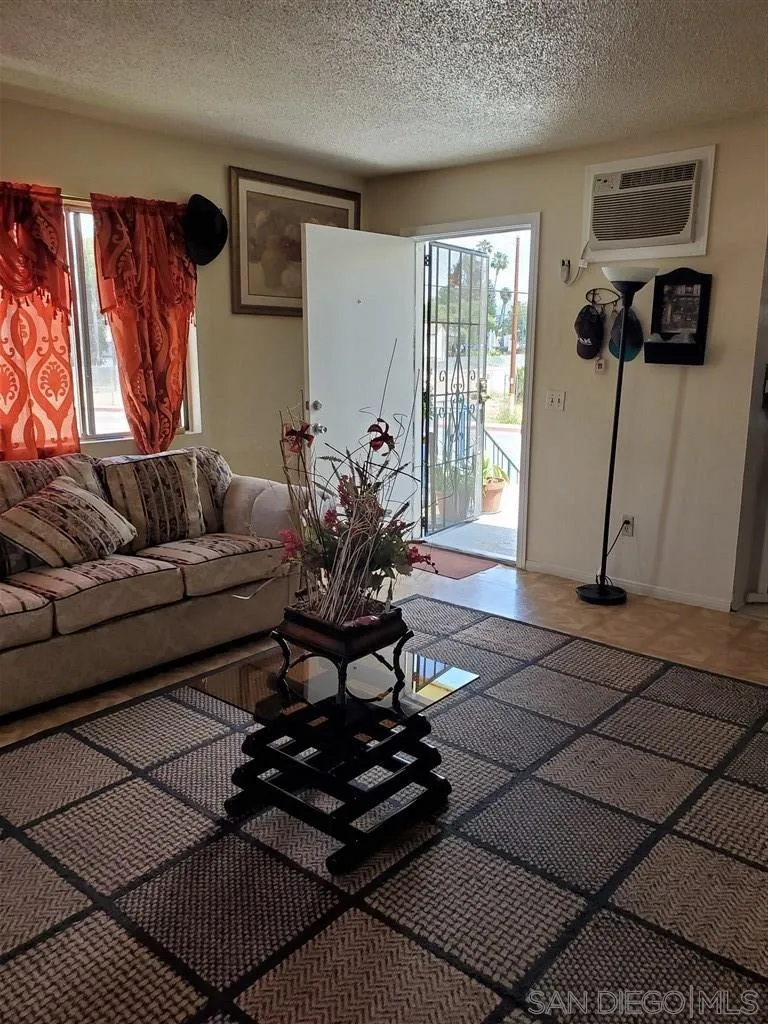 333 Lansing Circle Escondido, CA 92025 - Photo 9 of 18 a living room with furniture and a window