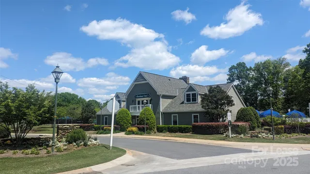 a view of a balcony with sitting area