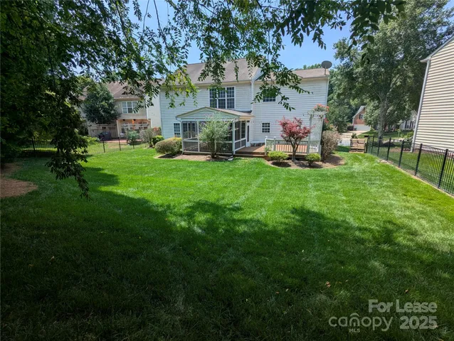 a childrens park with lots of swings and slides