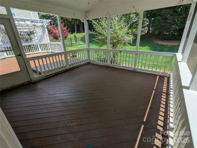 a view of balcony with furniture
