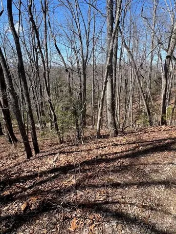 a view of wooden fence of a house