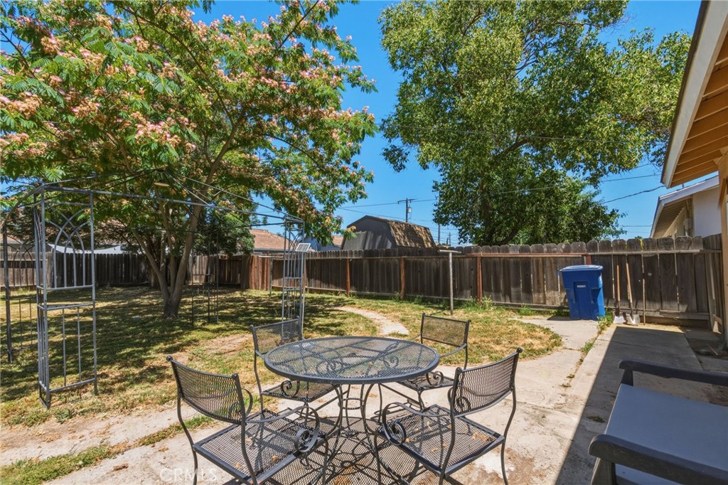 6812 Helton Street Winton, CA 95388 - Photo 22 of 24 a view of house with swimming pool and furniture