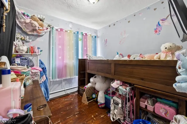 a room with furniture and musical instruments