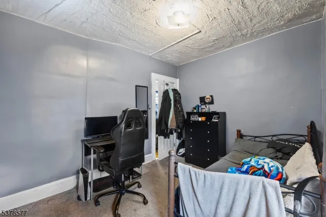 a picture of a bathroom with a shower