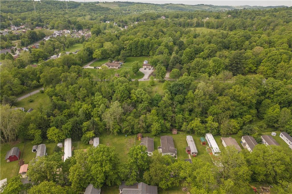 534 Finks Run Road McDonald, PA 15057 - Photo 15 of 35 a view of a forest with a lake