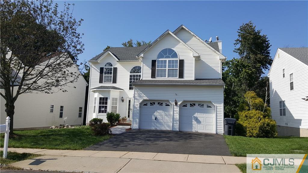 67 Shaffer Road Bridgewater, NJ 08807 - Photo 1 of 25 a front view of a house with garden