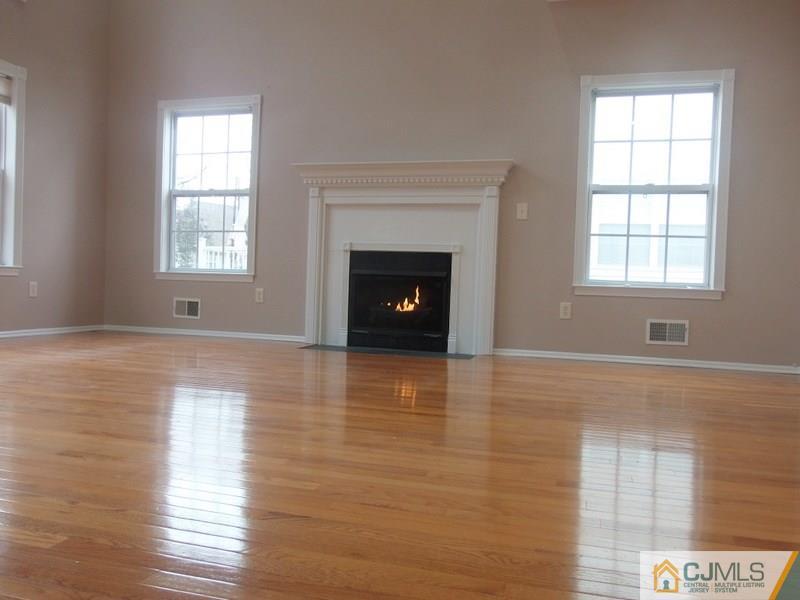 67 Shaffer Road Bridgewater, NJ 08807 - Photo 15 of 25 a view of an empty room with wooden floor and a window