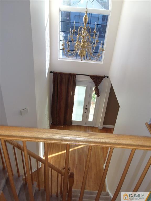 67 Shaffer Road Bridgewater, NJ 08807 - Photo 3 of 25 a view of staircase with wooden floor