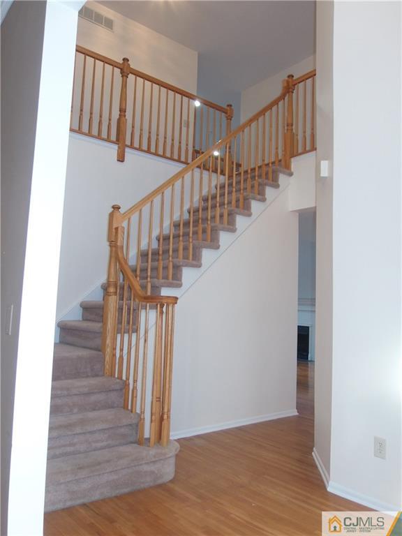 67 Shaffer Road Bridgewater, NJ 08807 - Photo 5 of 25 a view of entryway and hall with wooden floor