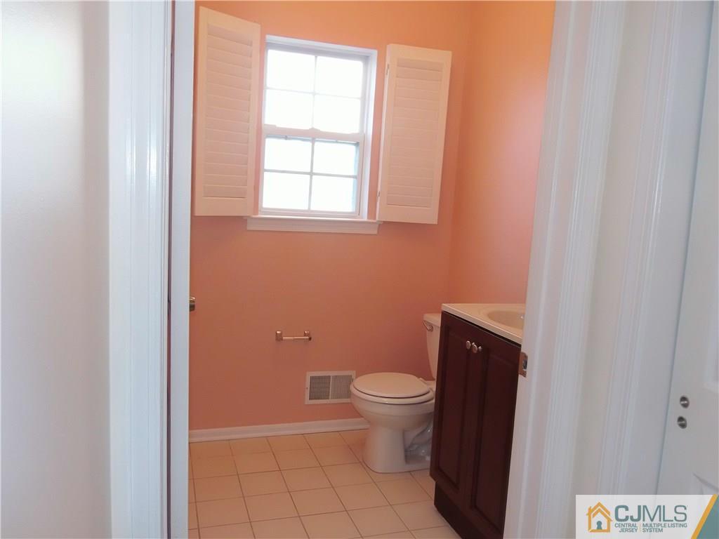 67 Shaffer Road Bridgewater, NJ 08807 - Photo 9 of 25 a bathroom with a toilet and a sink