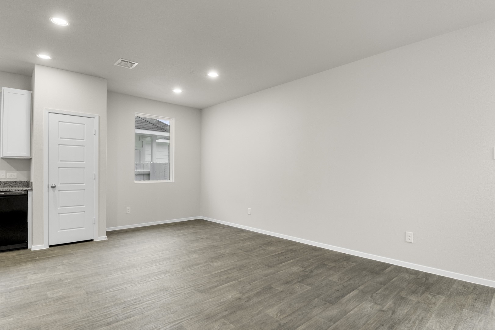 3043 Winding Creek Road Kyle, TX 78640 - Photo 14 of 30 an empty room with windows and closet