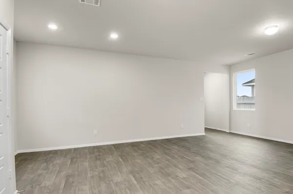 a kitchen with a sink stove top oven and cabinets