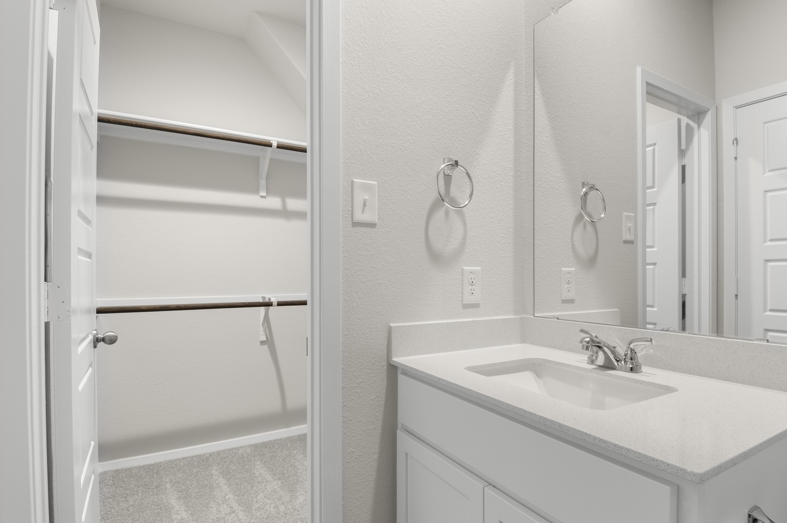 3043 Winding Creek Road Kyle, TX 78640 - Photo 23 of 30 a bathroom with a sink and mirror