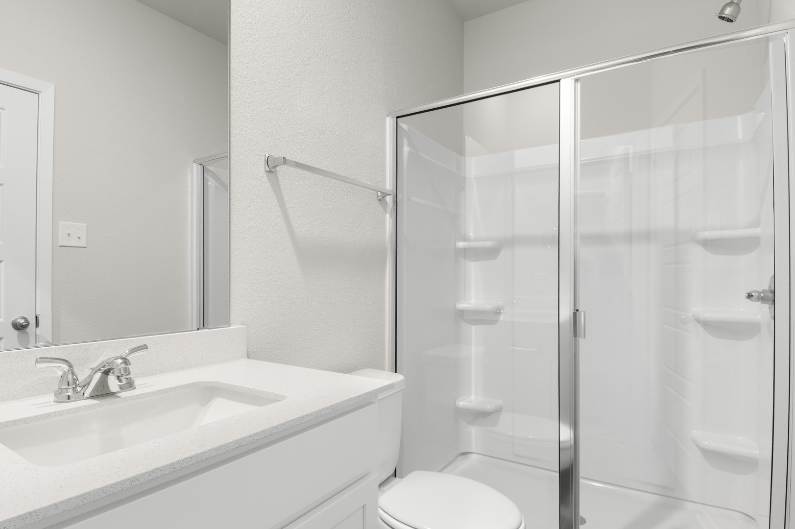3043 Winding Creek Road Kyle, TX 78640 - Photo 24 of 30 a bathroom with a sink and a mirror