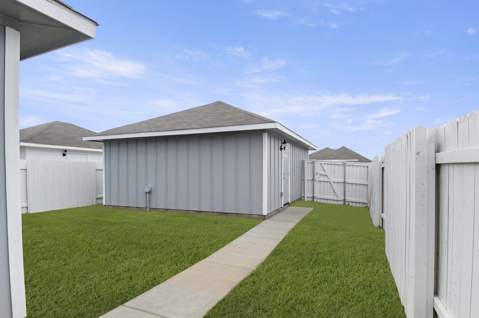 3043 Winding Creek Road Kyle, TX 78640 - Photo 28 of 30 a view of a house with backyard
