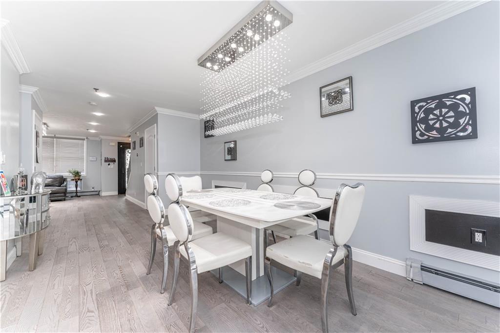 724 Egan Street Brooklyn, NY 11239 - Photo 9 of 10 a view of a dining room with furniture