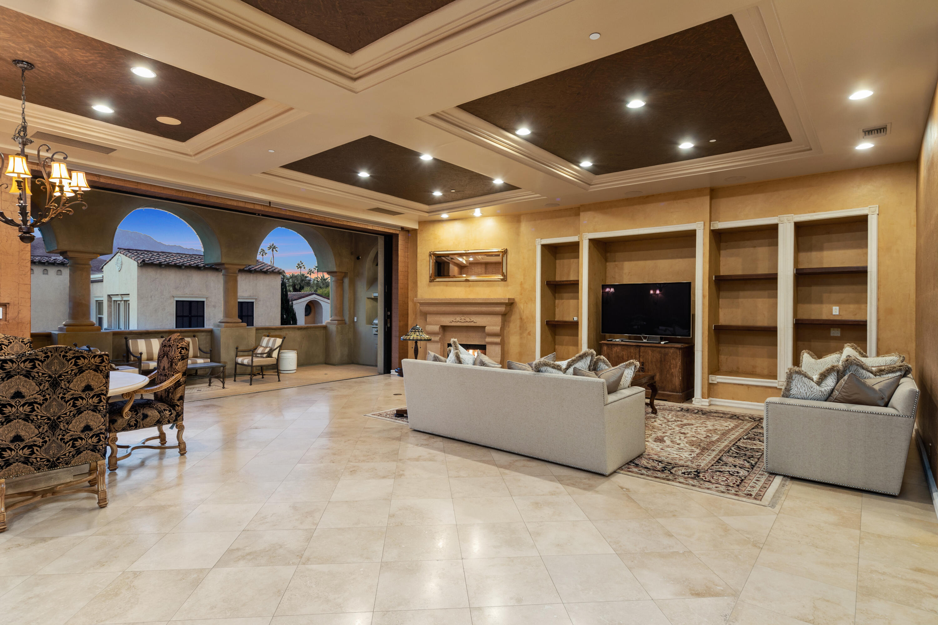 217 Via Veneto Rancho Mirage, CA 92270 - Photo 11 of 66 a living room with furniture and a large window