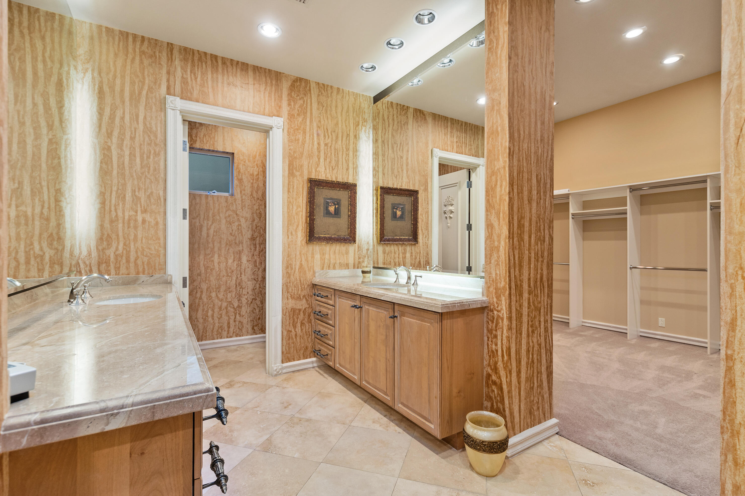 217 Via Veneto Rancho Mirage, CA 92270 - Photo 12 of 66 a bathroom with a tub a sink and mirror