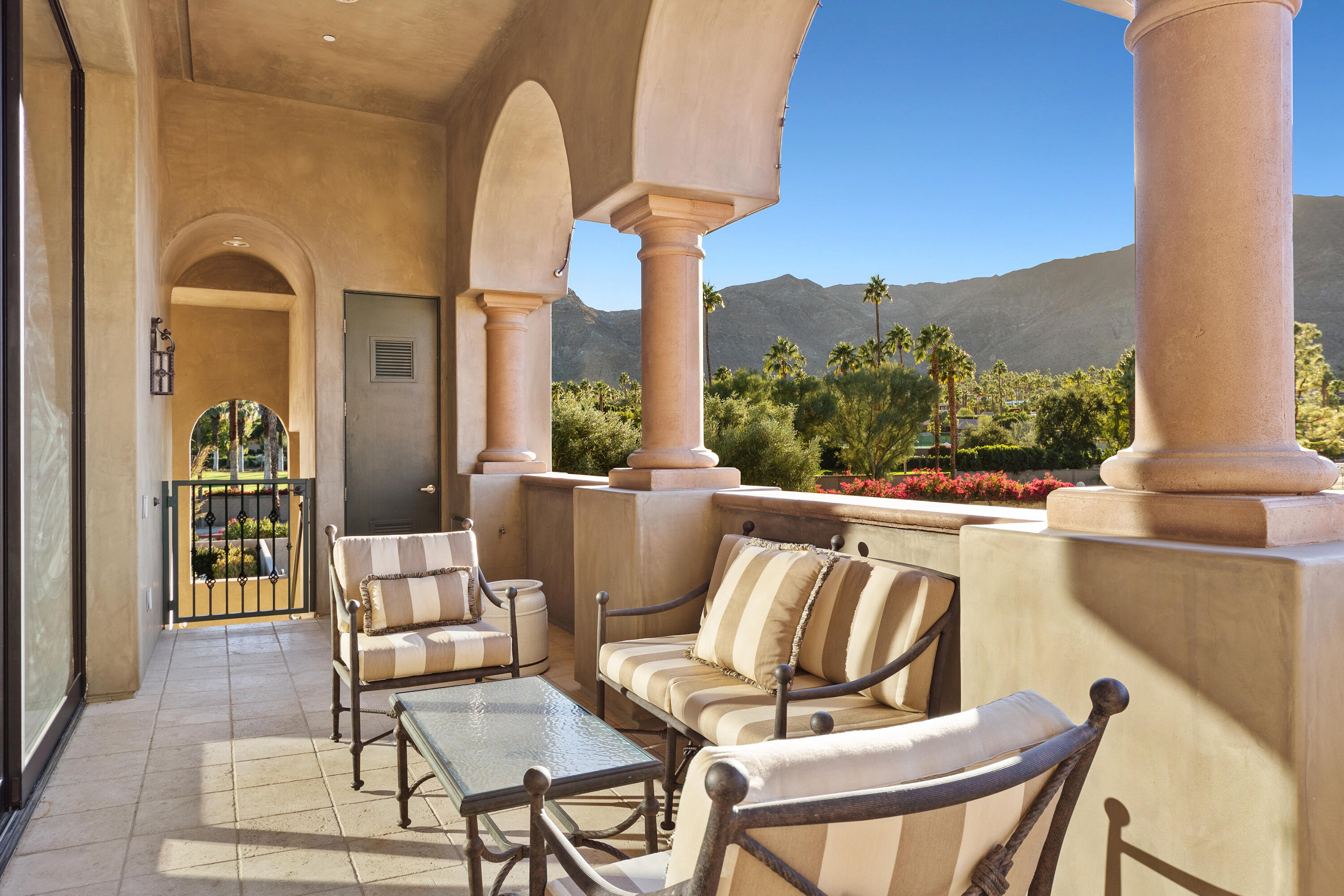 217 Via Veneto Rancho Mirage, CA 92270 - Photo 35 of 66 a view of a chairs and table in a balcony