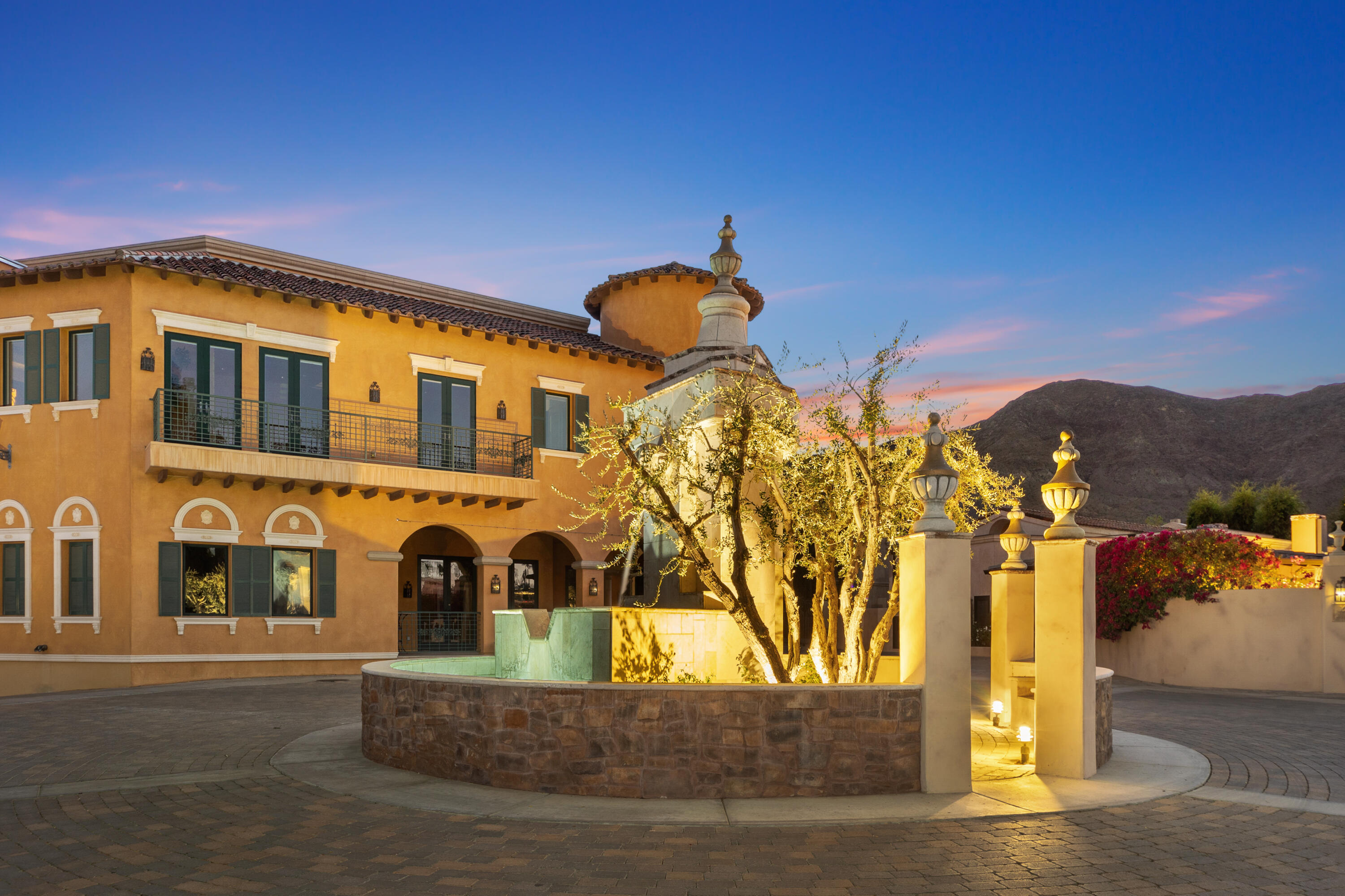 217 Via Veneto Rancho Mirage, CA 92270 - Photo 44 of 66 a front view of a house with a yard