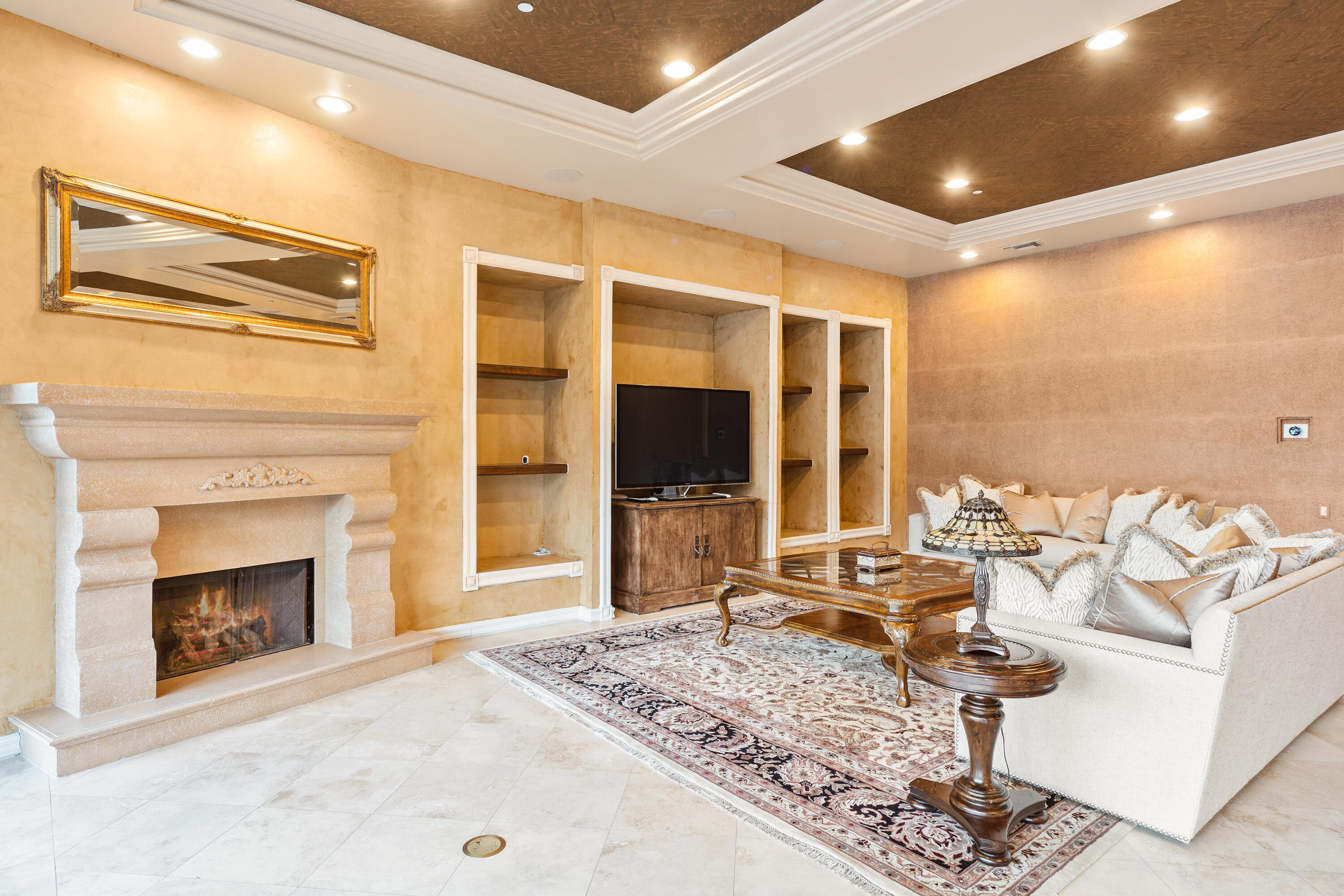 217 Via Veneto Rancho Mirage, CA 92270 - Photo 47 of 66 a living room with furniture fireplace and flat screen tv