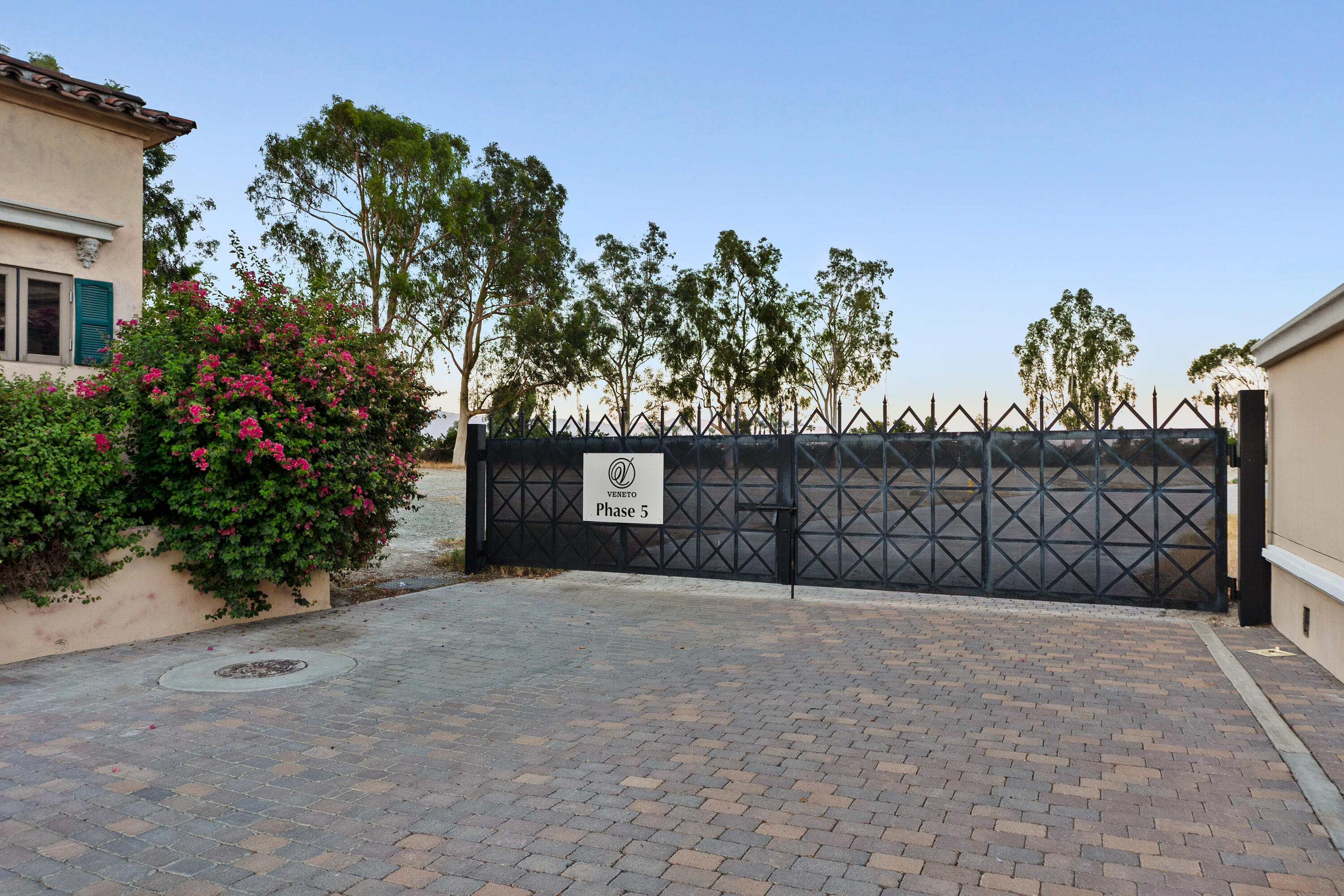 217 Via Veneto Rancho Mirage, CA 92270 - Photo 66 of 66 a view of a house with a yard and potted plants
