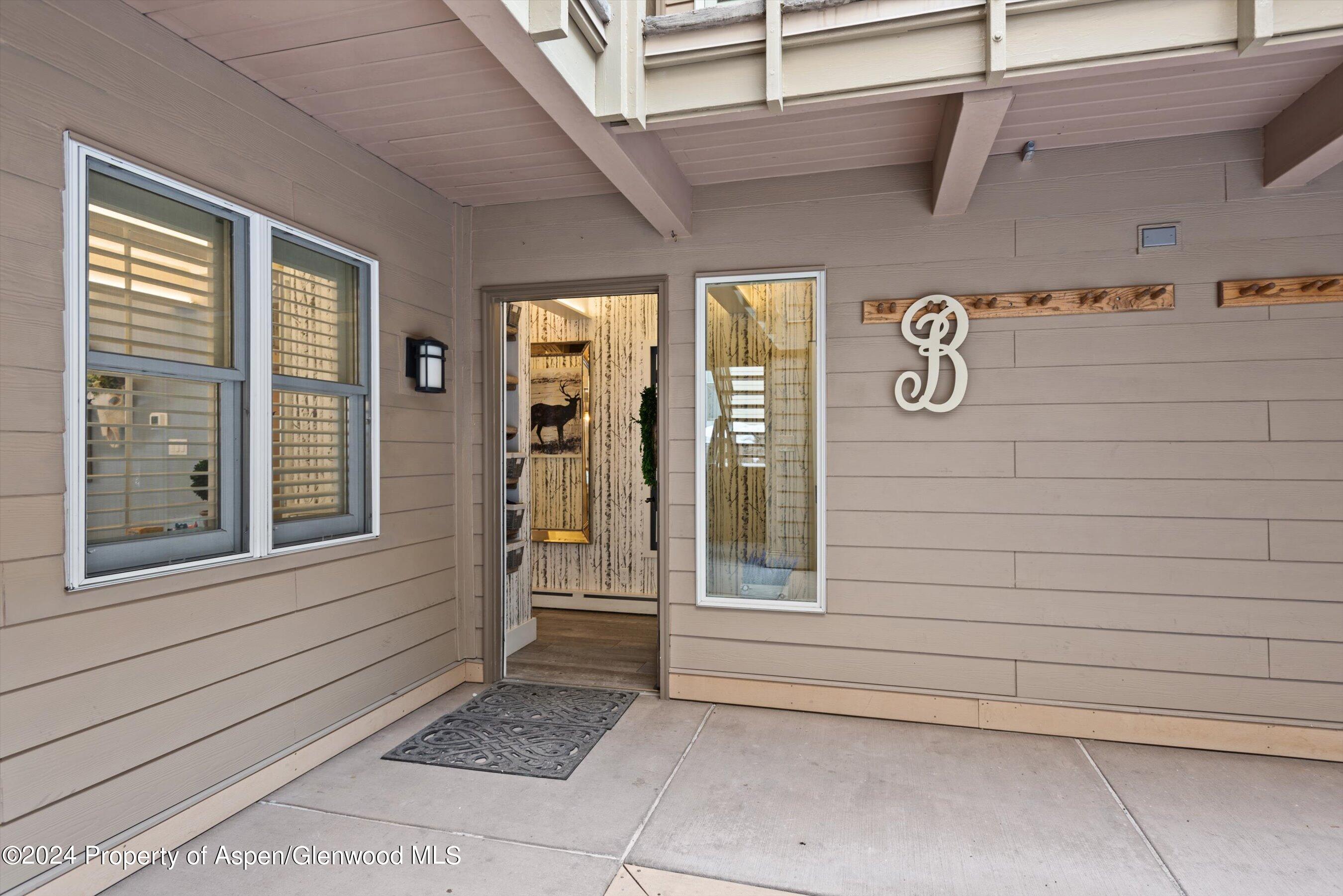 825 East Hopkins Avenue, Unit 1N Aspen, CO 81611 - Photo 12 of 16 a view of front door