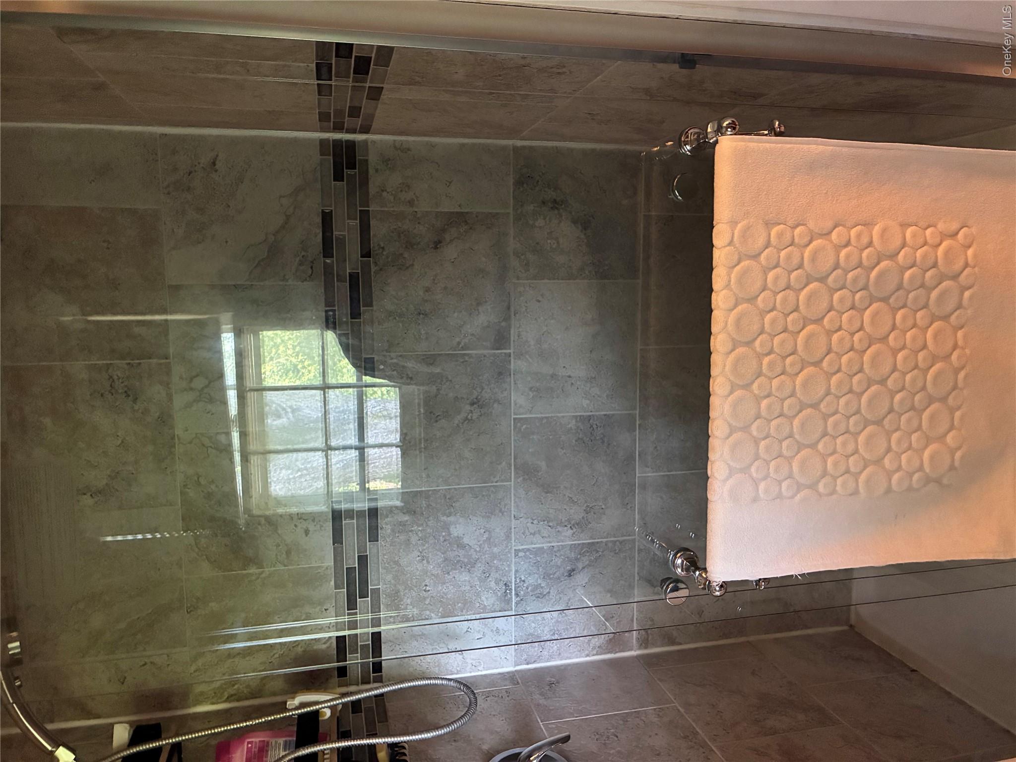 24 Ann Boulevard Spring Valley, NY 10977 - Photo 15 of 25 a bathroom with a shower