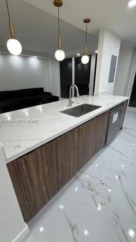 a view of balcony with wooden floor