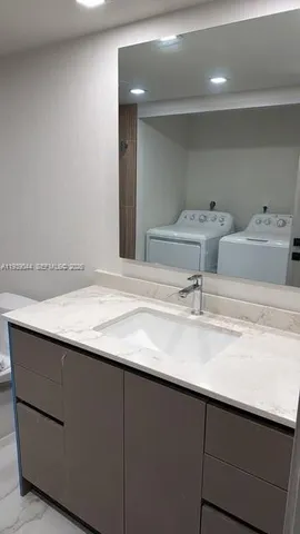 a view of a city with tall buildings