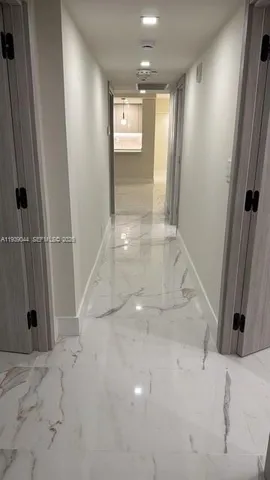 a living room with lots of gym equipment