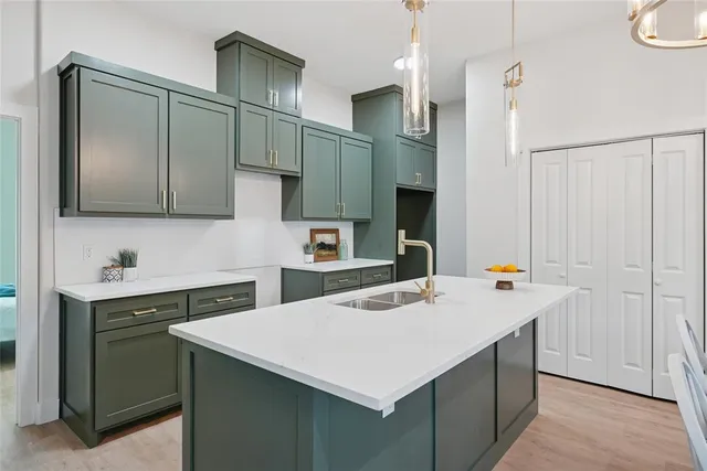 a kitchen that has a cabinets and a stove