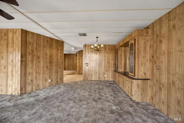 a view of an entryway with a chandelier