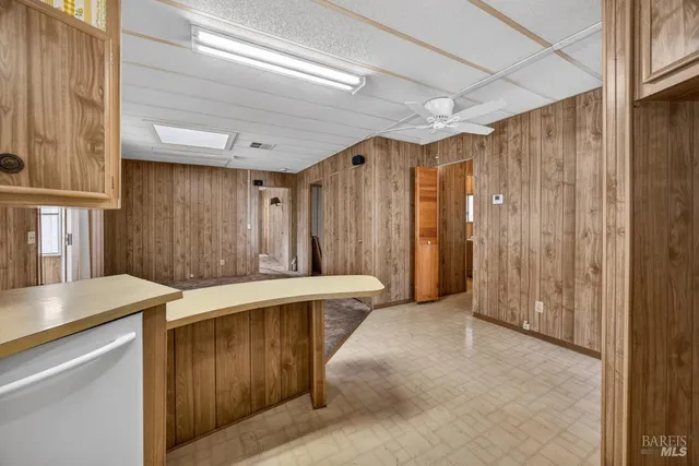 a bathroom with a sink a mirror and a shower