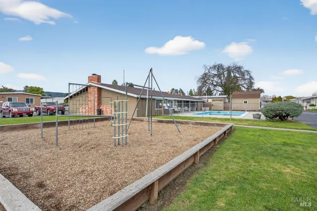 a room with furniture and air hockey table