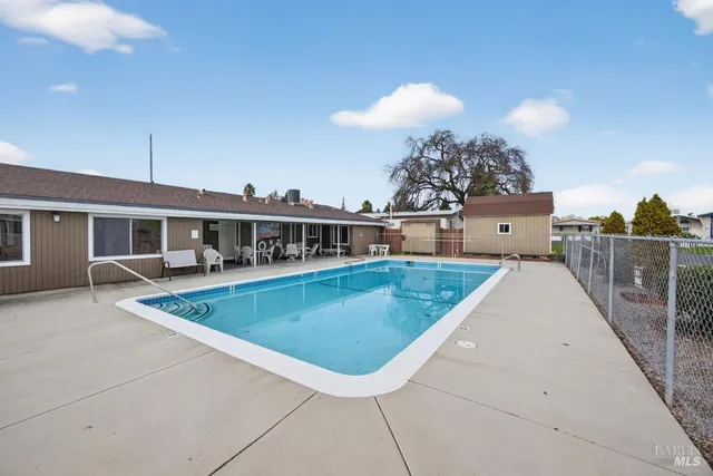 a view of a hallway with bookshelf