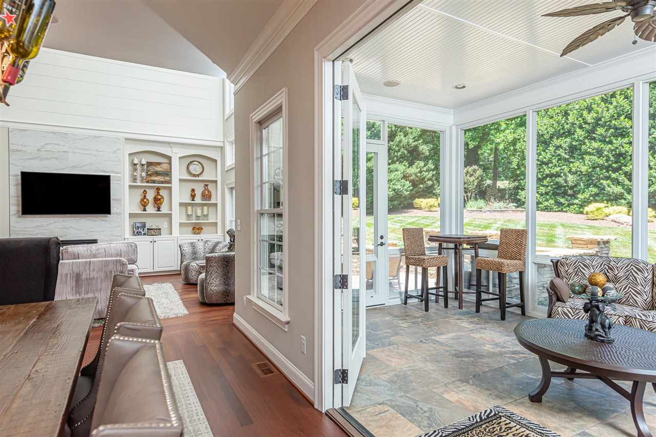 2024 Macon Ridge Road Raleigh, NC 27613 - Photo 13 of 30 Easy Breeze windows and electric fireplace makes this room comfortable in 4 seasons. Windows are awesome during pollen season 4 Season Room
